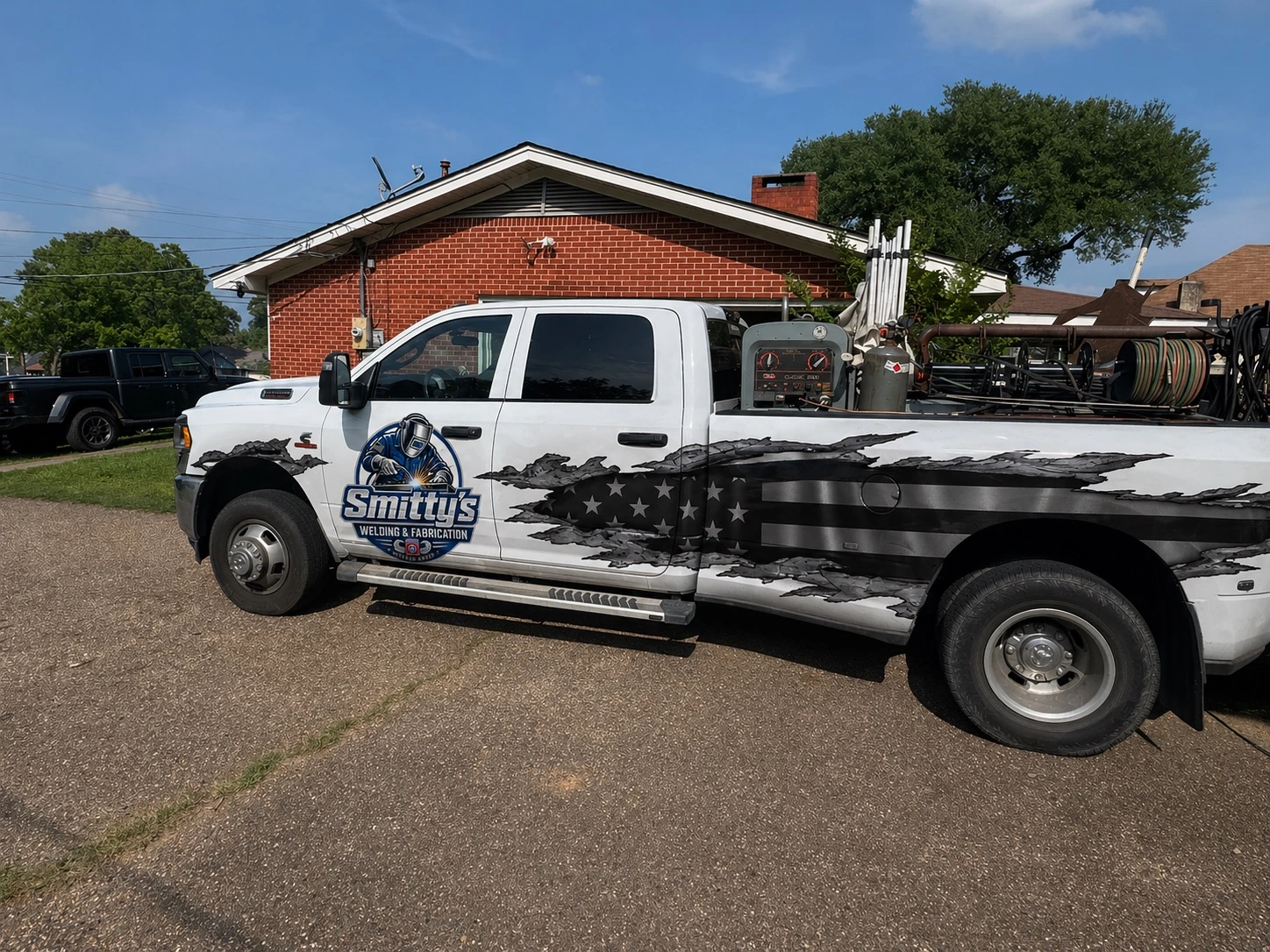 Smitty’s identity applied to a welding work truck